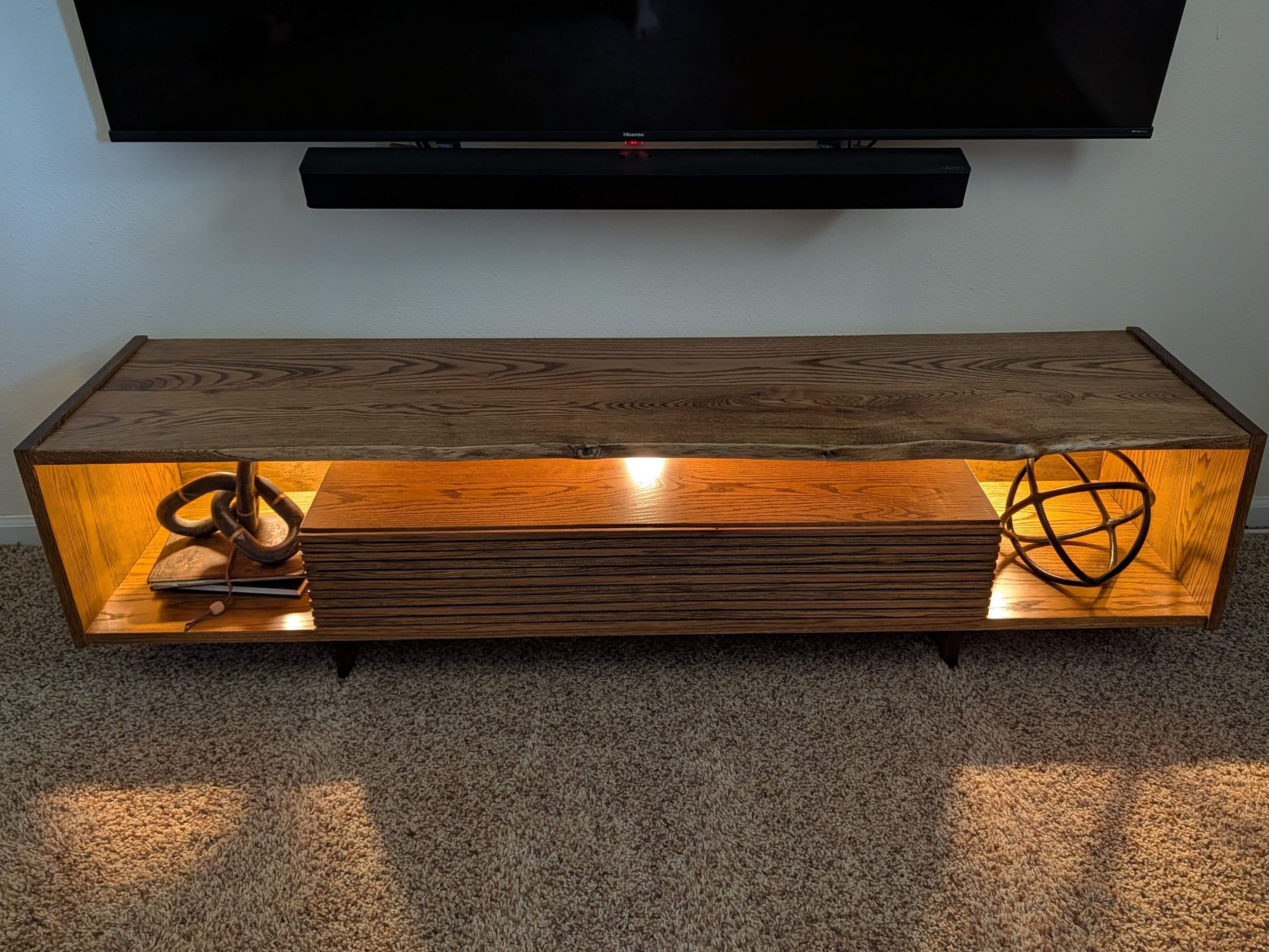 Live-edge TV stand with integrated lighting